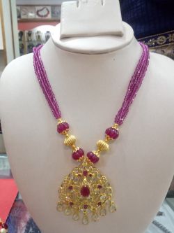 4. Beautiful necklace with art ruby stone and pink crystals